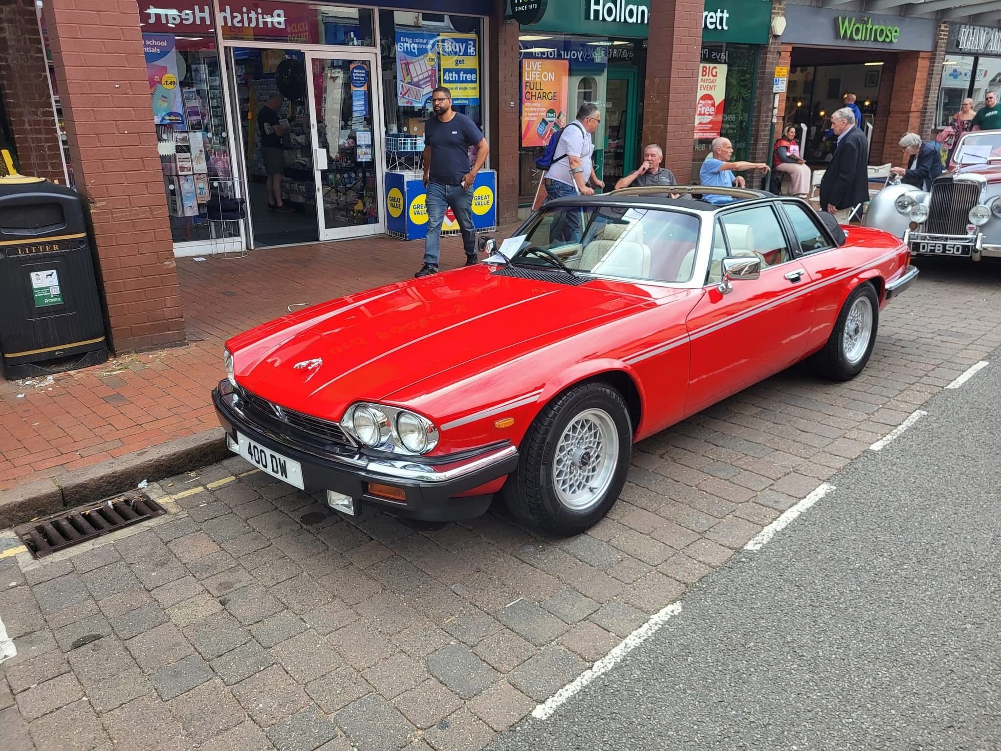 Dean's red 1985 V12 Jaguar XJS at a classic car show